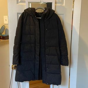 Woman’s dark grey down parka